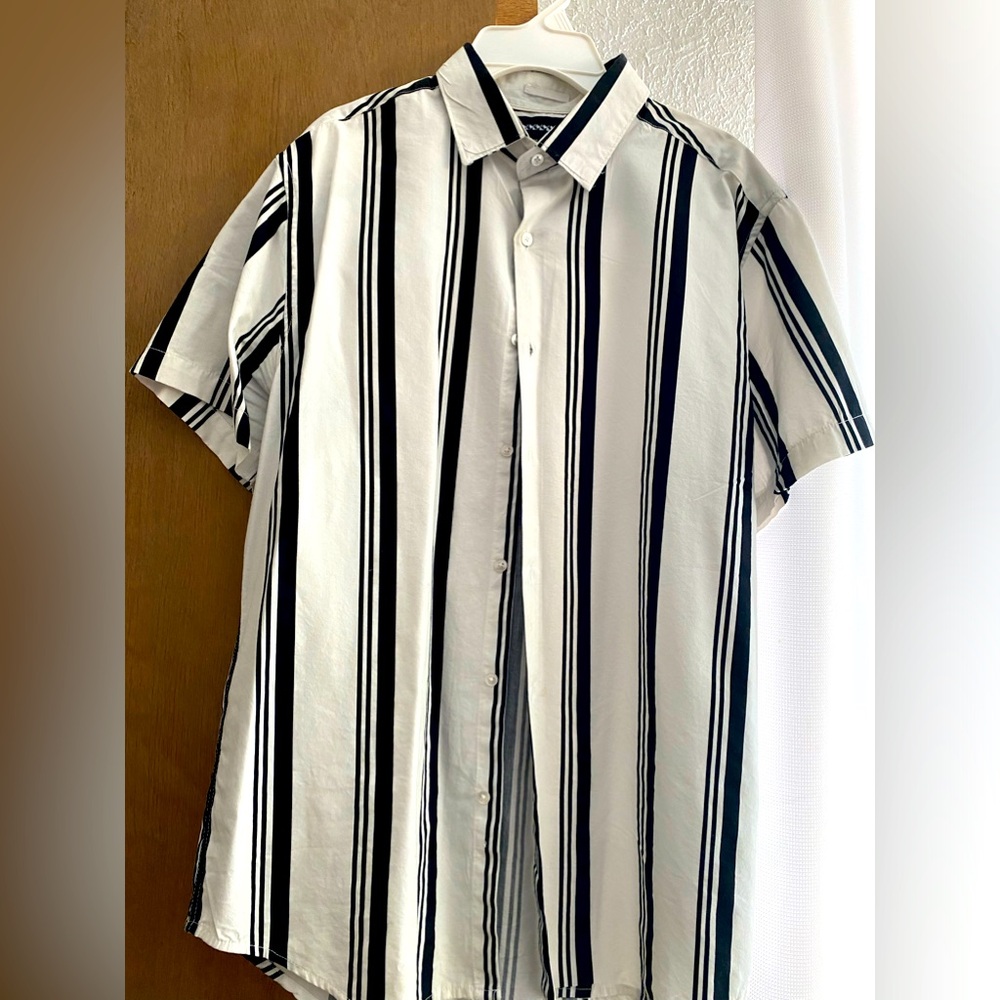 Young men’s black and white white striped button up shirt